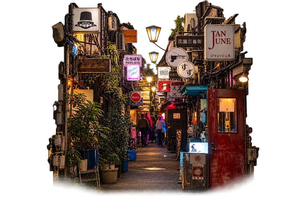 Signs and lanterns in a narrow Golden Gai lane after dark.