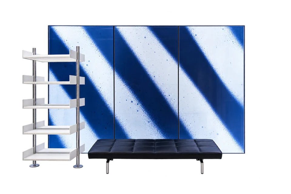 Blue-and-white graphic panel, shelf and black bench adapted from Off-White Tokyo’s interior.