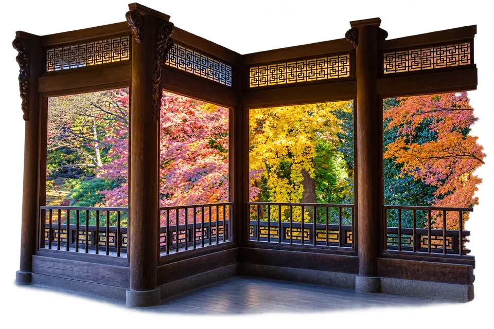 Autumn trees framed by the wooden pavilion at Shinjuku Gyoen.